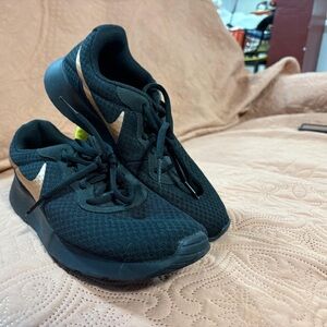 Nike  Black Sneakers with Gold Accents